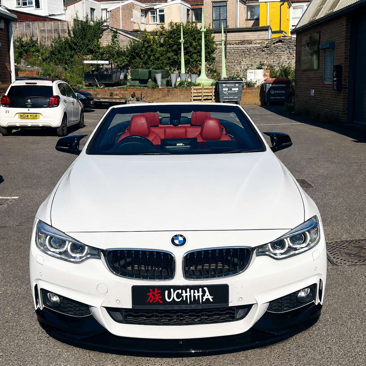 White BMW 420i with red interior fitted with a M-Sport Front Splitter, Side Skirts, Rear Diffuser and Mirror caps as part of a body kit fitout. 
