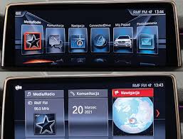 BMW NBT EVO infotainment system display with various icons and information on a dark background